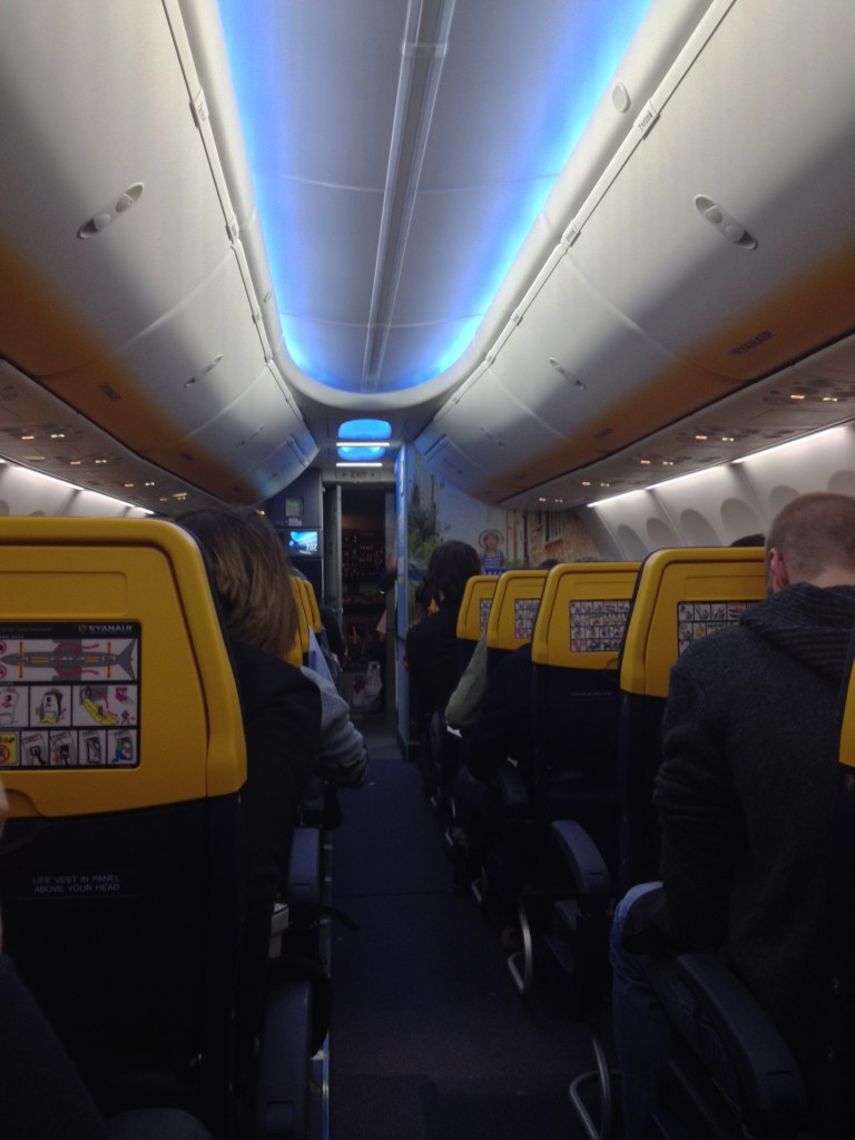 Ryanair's brand new interieur featuring blue LEDs, slimline seats and no more yellow, almost.