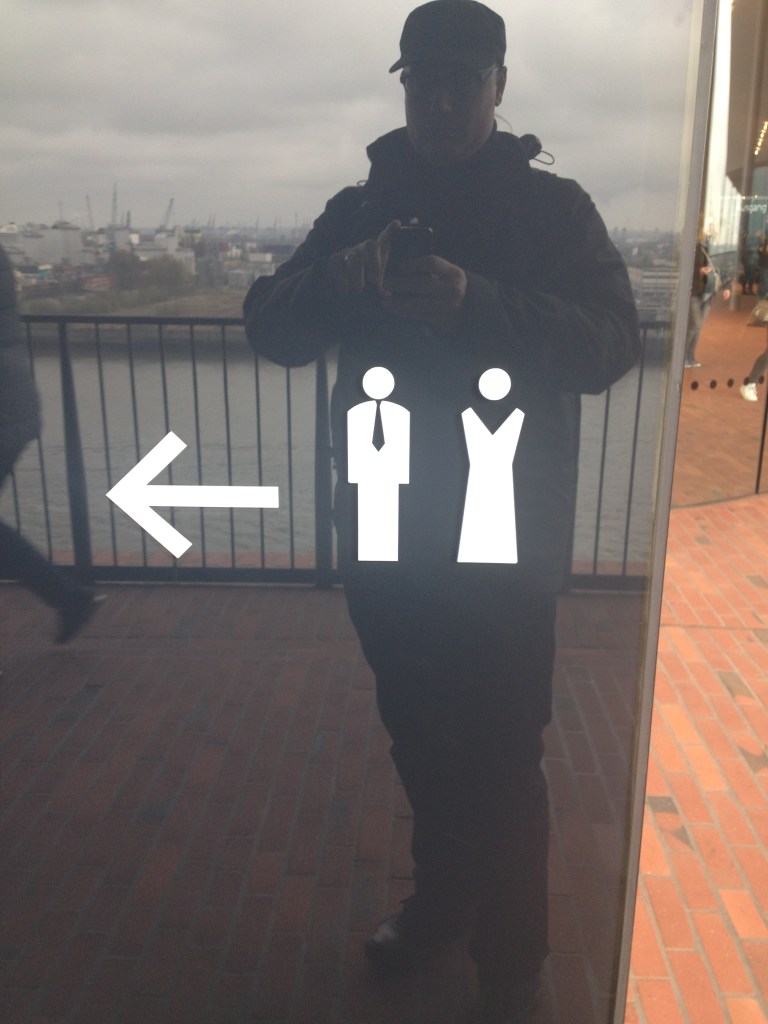 Toilettenpiktogramme in ordentlicher Abendkleidung