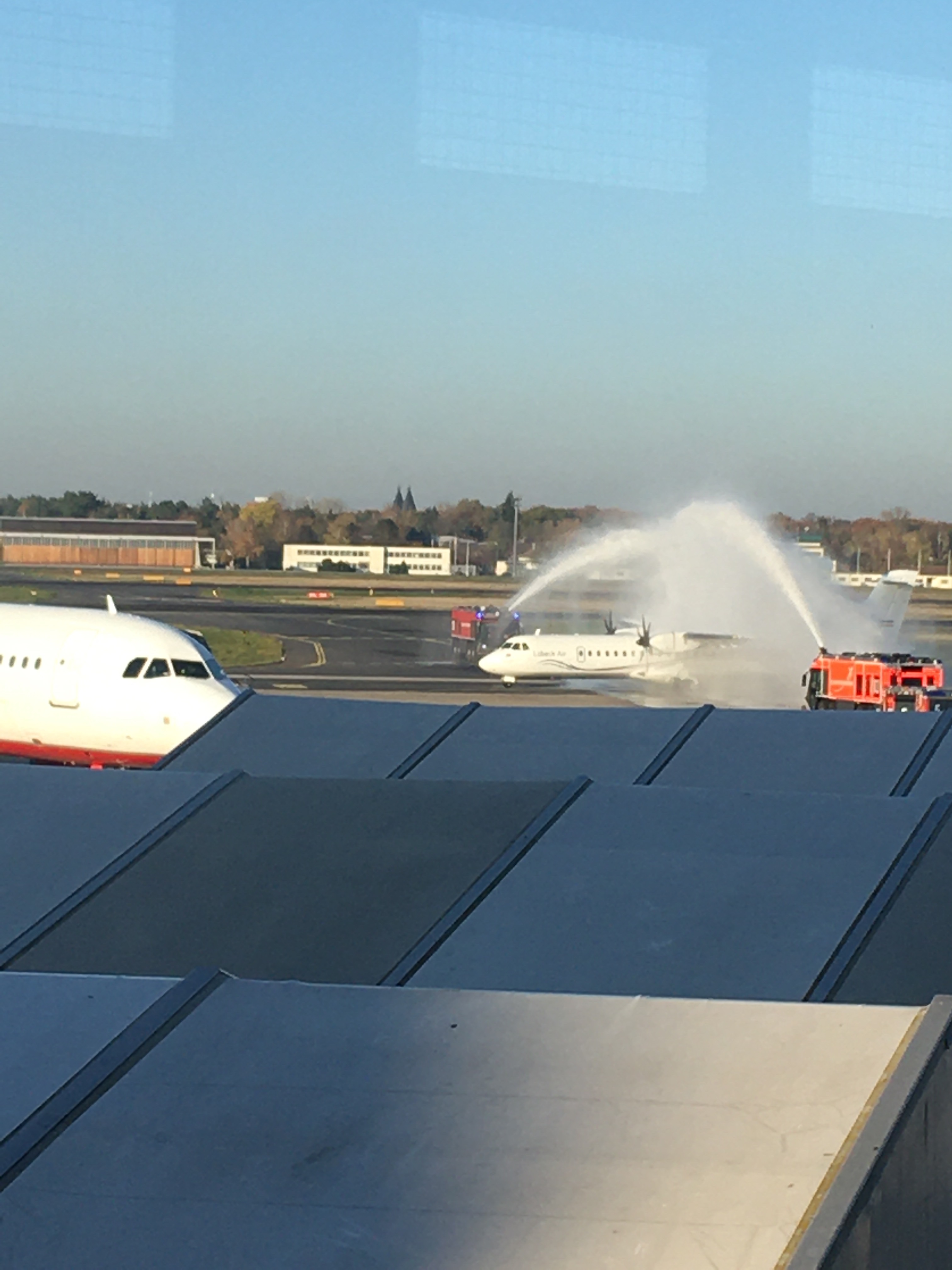 Water canon salute for Lübeck Air ATR 72 on the final day of operation s at TXL Berlin Tegel Airport