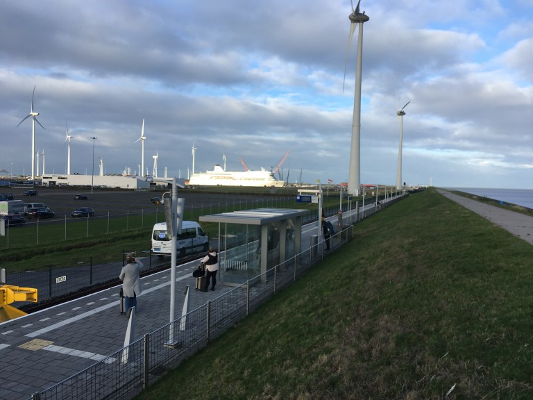 Intermodality: trains station, shuttle bus and M/V Romantika ferry in Eemshaven port.