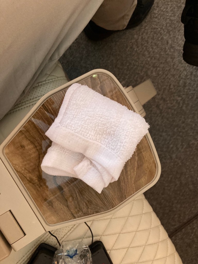 Emirates Premium Economy hot towel